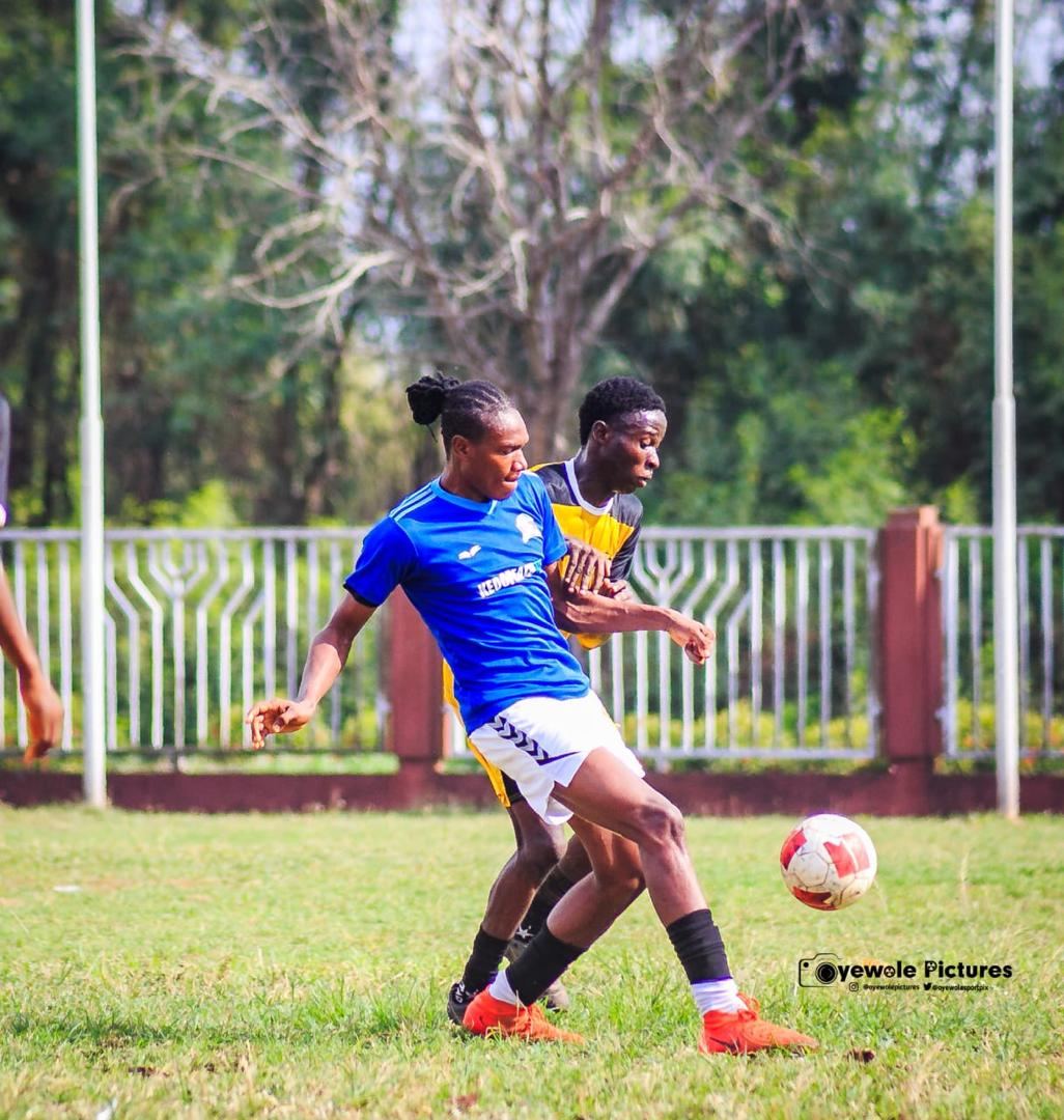KEDOPEACH player challenging for the ball during a match